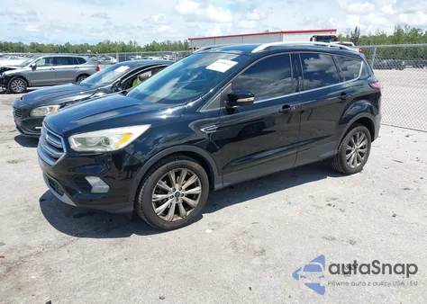 2017 Ford Escape Titanium z USA, uszkodzony, nr VIN 1FMCU0JD2HUF02415